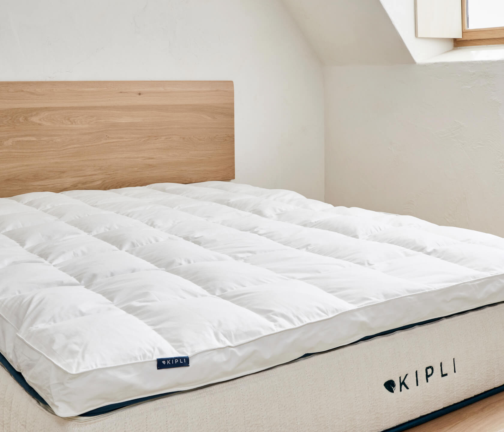 Surmatelas en plumes et duvet